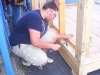 Breathitt ATC Carpentry student Robert Butler works on a building project
