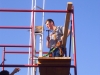Breathitt ATC Electricity student Dustin Robinson secures a pin holding the windmill mount in place